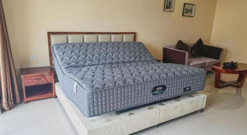 Bed in Foshan Baolong Hotel