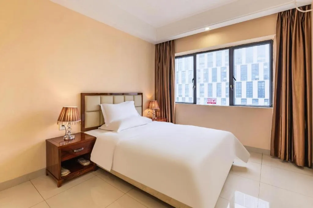 Bed in Foshan Baolong Hotel