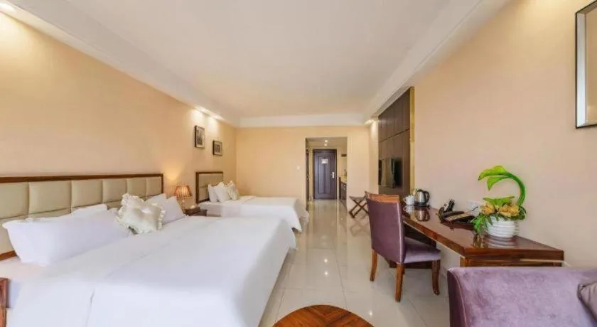 Bed in Foshan Baolong Hotel