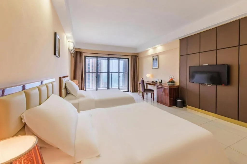 Bed in Foshan Baolong Hotel