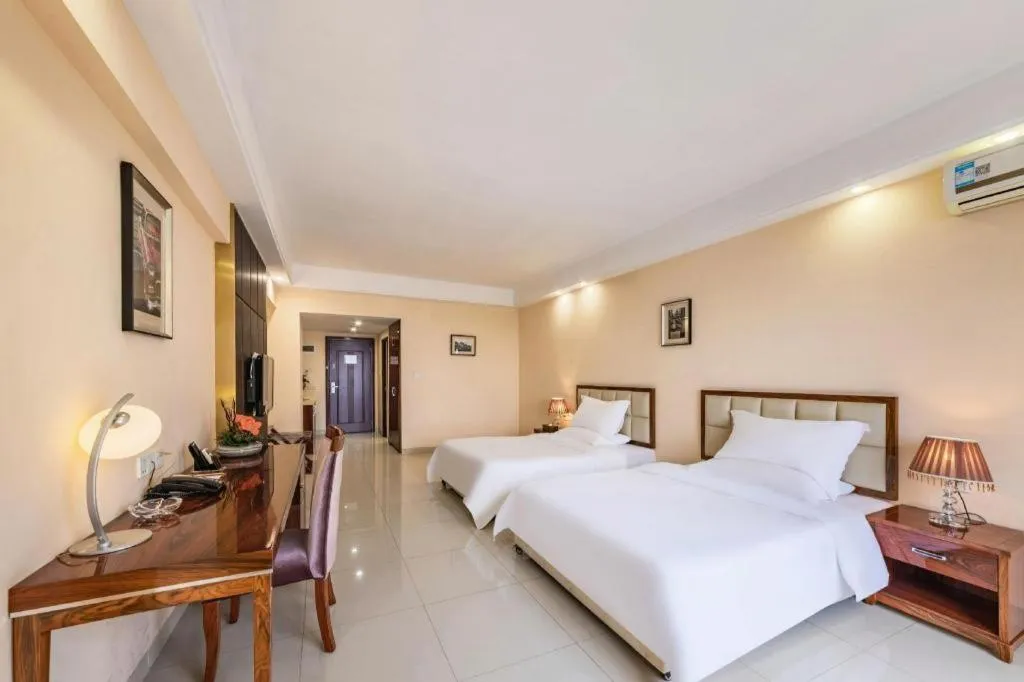 Bed in Foshan Baolong Hotel