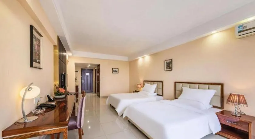 Bed in Foshan Baolong Hotel