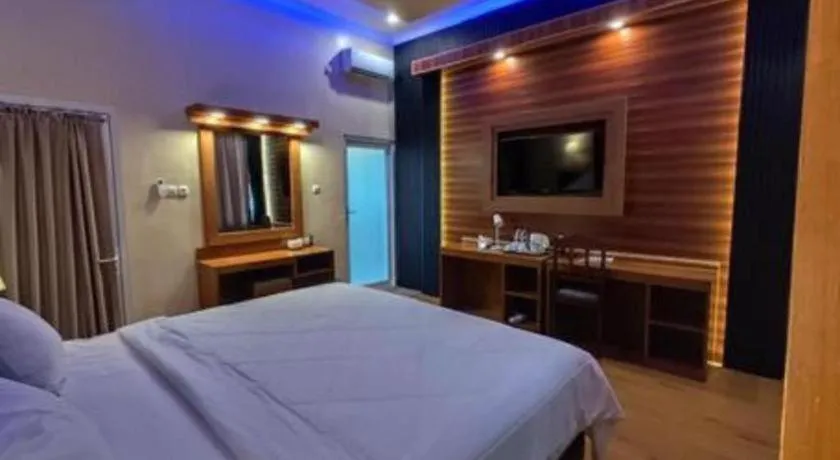 Bed in Parai Beach Resort Telengria