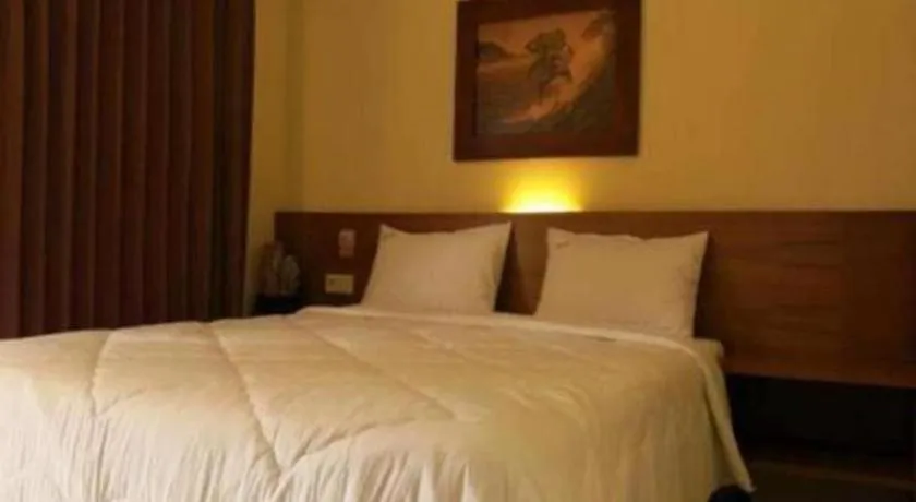 Bed in Parai Beach Resort Telengria