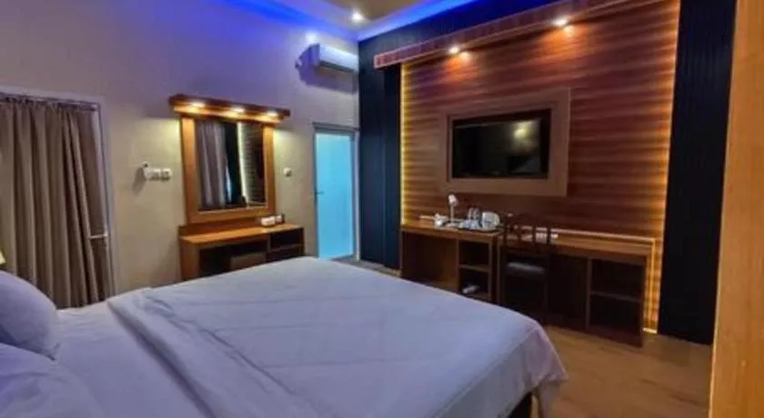 Bed in Parai Beach Resort Telengria