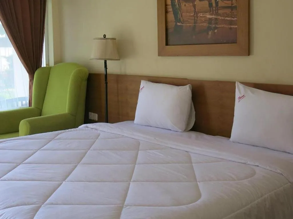 Bed in Parai Beach Resort Telengria