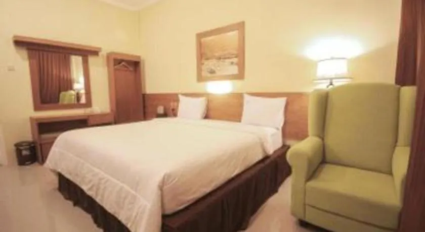 Bed in Parai Beach Resort Telengria