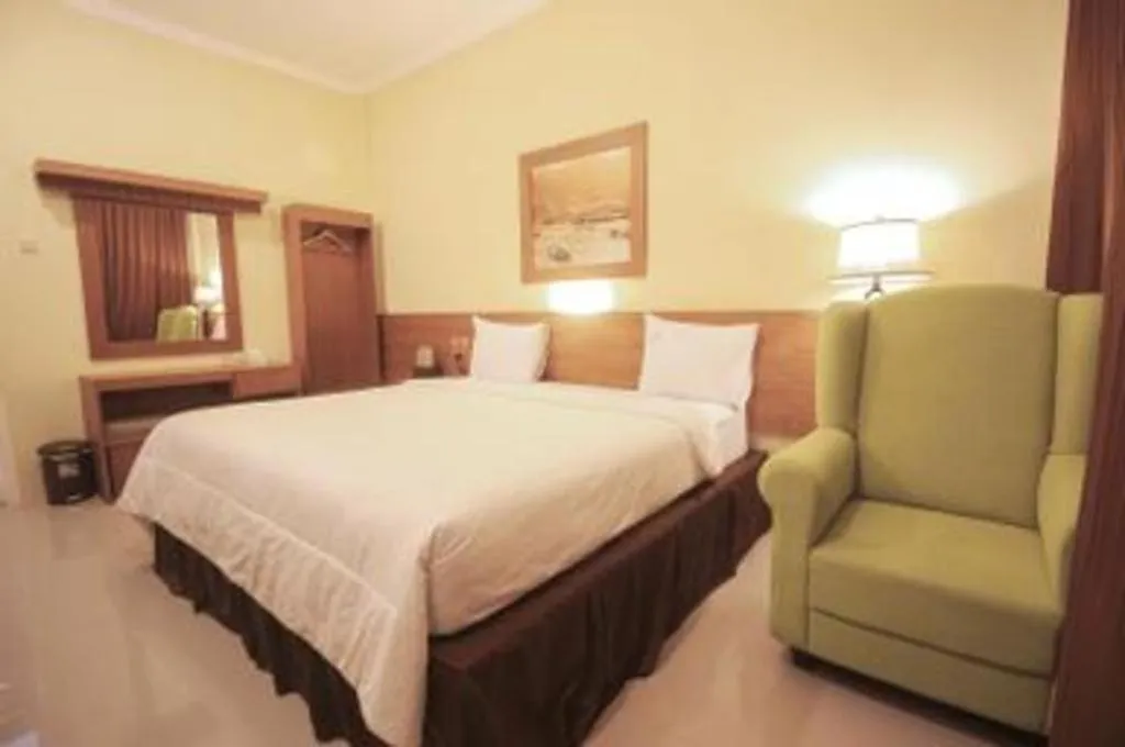 Bed in Parai Beach Resort Telengria