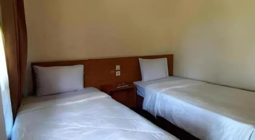 Bed in Parai Beach Resort Telengria Bed in Parai Beach Resort Telengria