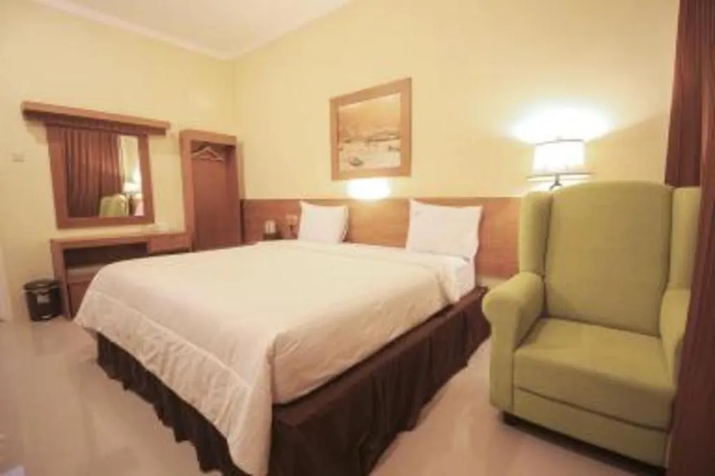 Bed in Parai Beach Resort Telengria