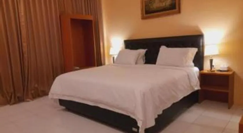 Bed in Parai Beach Resort Telengria