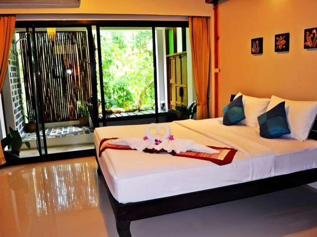 Bed in Oopkaew Resort