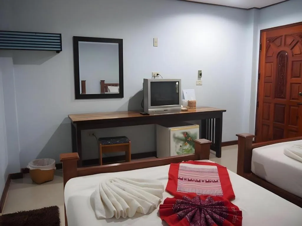 Bed in Oopkaew Resort