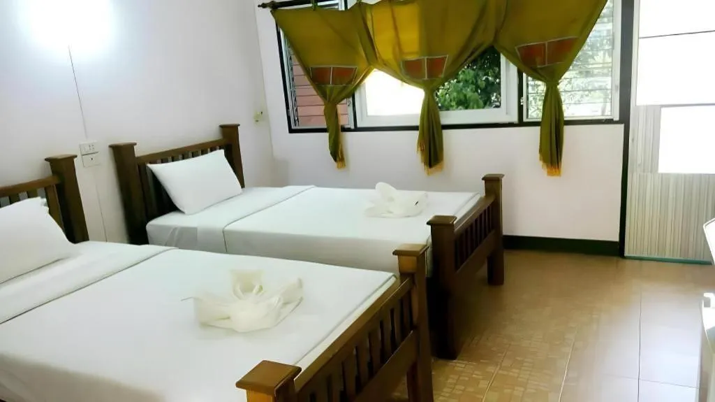 Bed in Oopkaew Resort