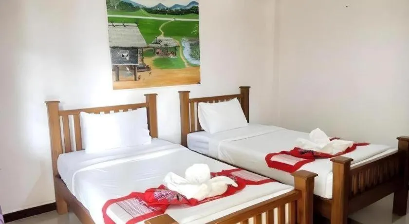 Bed in Oopkaew Resort