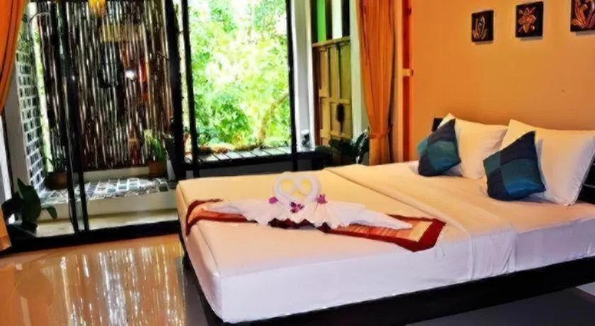 Bed in Oopkaew Resort