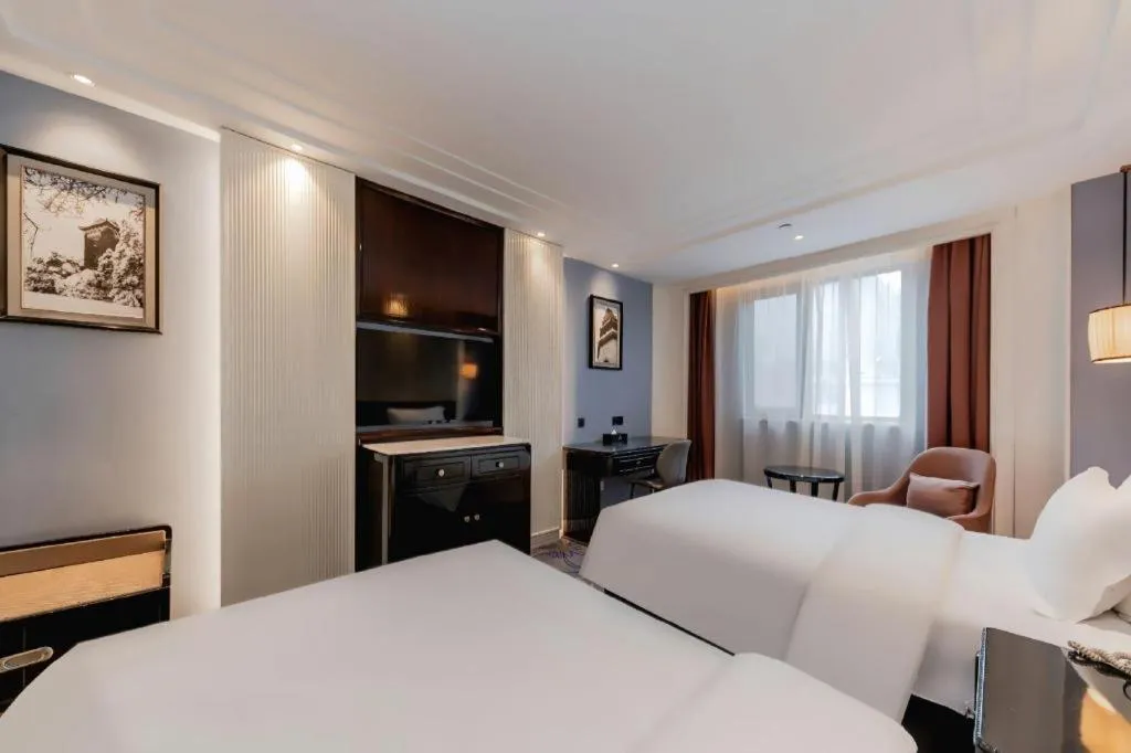 Bed in Jinjiang Metropolo Hotel Nanjing Confucius Temple Branch