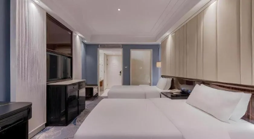 Bed in Jinjiang Metropolo Hotel Nanjing Confucius Temple Branch