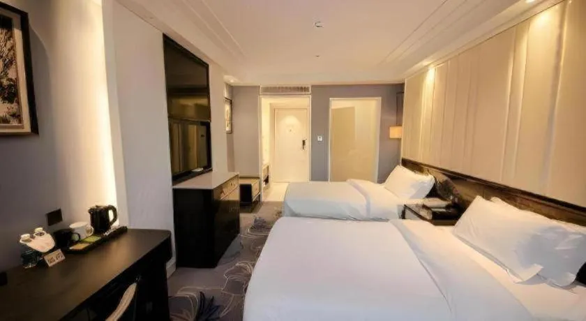 Bed in Jinjiang Metropolo Hotel Nanjing Confucius Temple Branch