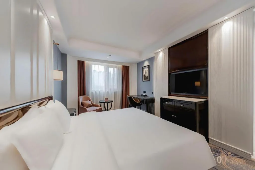 Bed in Jinjiang Metropolo Hotel Nanjing Confucius Temple Branch