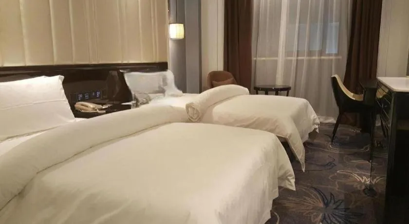 Bed in Jinjiang Metropolo Hotel Nanjing Confucius Temple Branch