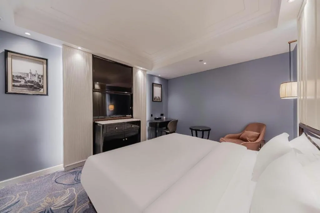 Bed in Jinjiang Metropolo Hotel Nanjing Confucius Temple Branch