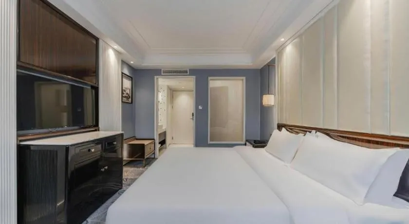 Bed in Jinjiang Metropolo Hotel Nanjing Confucius Temple Branch