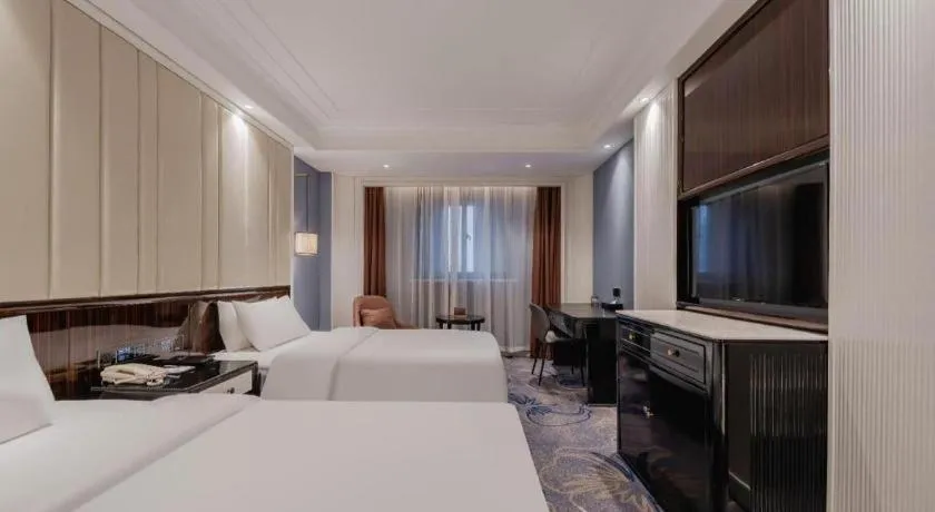 Bed in Jinjiang Metropolo Hotel Nanjing Confucius Temple Branch