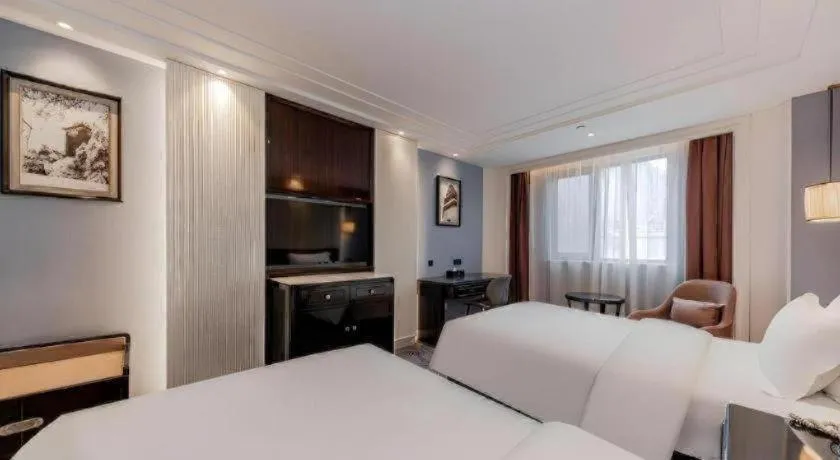 Bed in Jinjiang Metropolo Hotel Nanjing Confucius Temple Branch