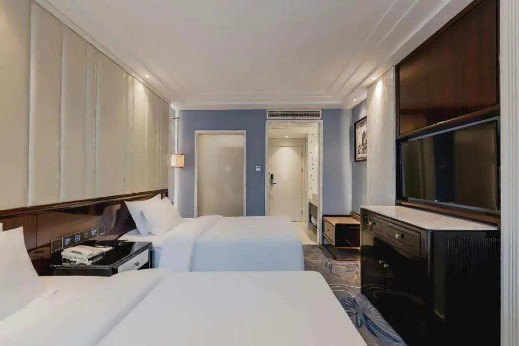 Bed in Jinjiang Metropolo Hotel Nanjing Confucius Temple Branch