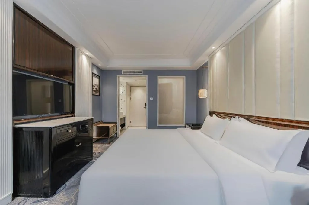 Bed in Jinjiang Metropolo Hotel Nanjing Confucius Temple Branch