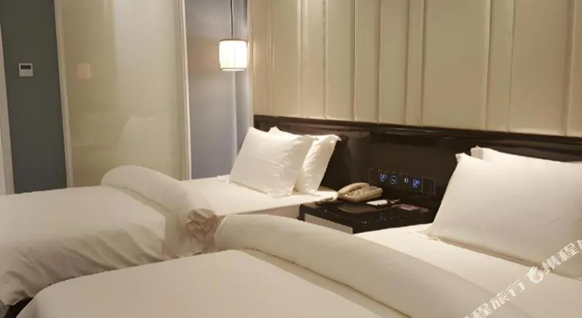 Bed in Jinjiang Metropolo Hotel Nanjing Confucius Temple Branch