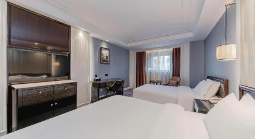 Bed in Jinjiang Metropolo Hotel Nanjing Confucius Temple Branch