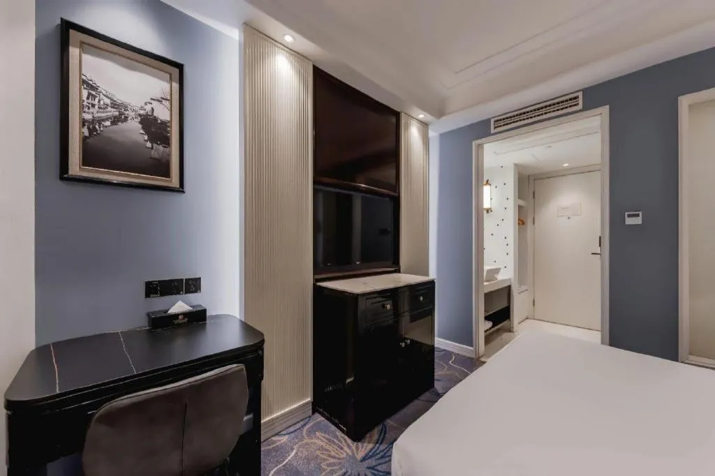 Bed in Jinjiang Metropolo Hotel Nanjing Confucius Temple Branch