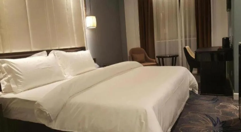 Bed in Jinjiang Metropolo Hotel Nanjing Confucius Temple Branch