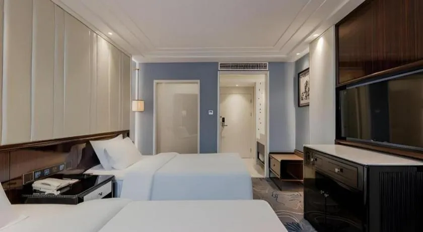 Bed in Jinjiang Metropolo Hotel Nanjing Confucius Temple Branch