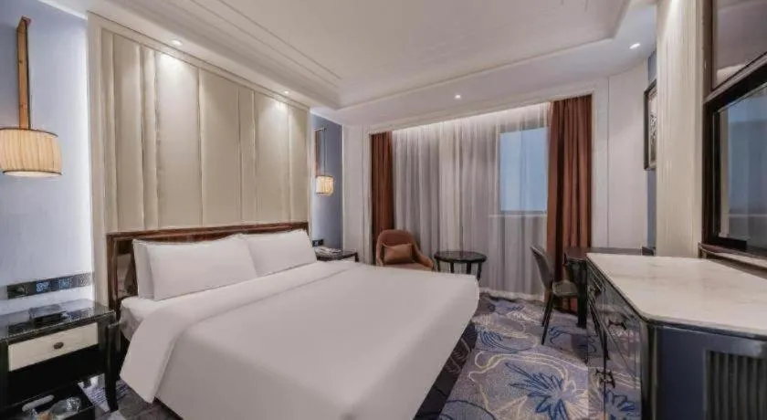 Bed in Jinjiang Metropolo Hotel Nanjing Confucius Temple Branch