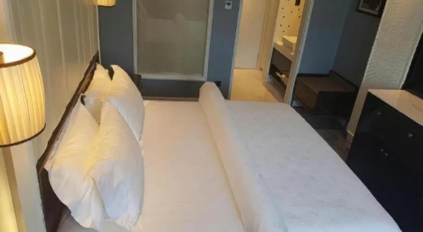 Bed in Jinjiang Metropolo Hotel Nanjing Confucius Temple Branch