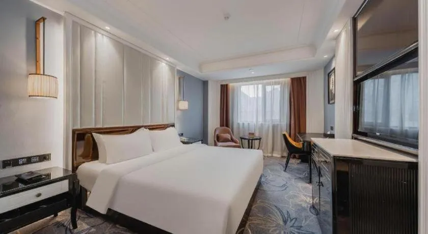 Bed in Jinjiang Metropolo Hotel Nanjing Confucius Temple Branch