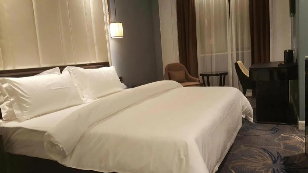 Bed in Jinjiang Metropolo Hotel Nanjing Confucius Temple Branch