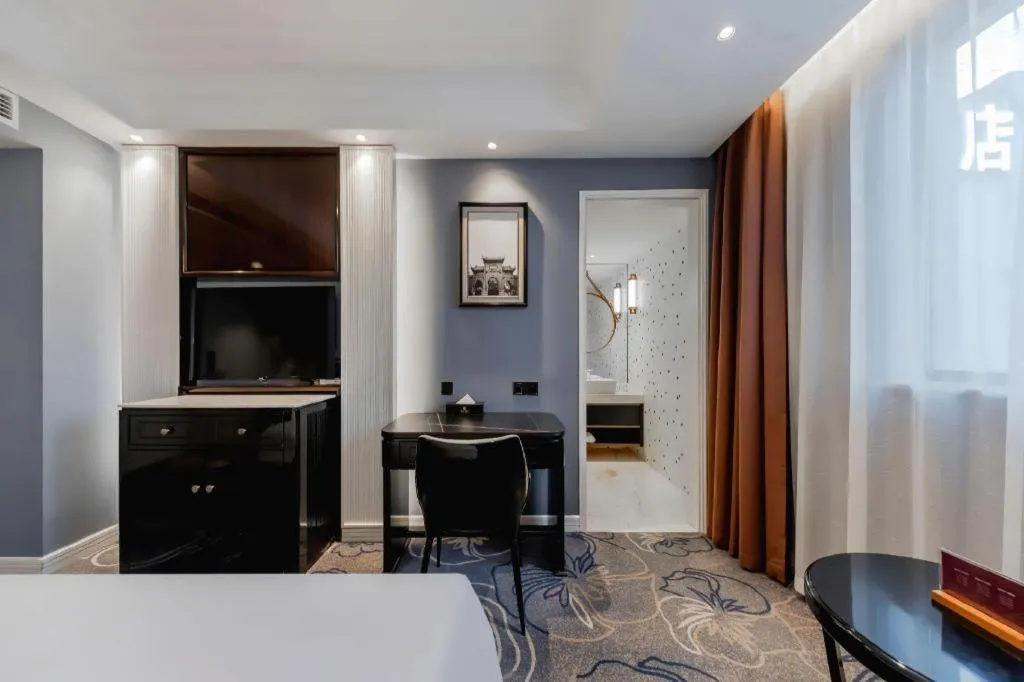 Bed in Jinjiang Metropolo Hotel Nanjing Confucius Temple Branch