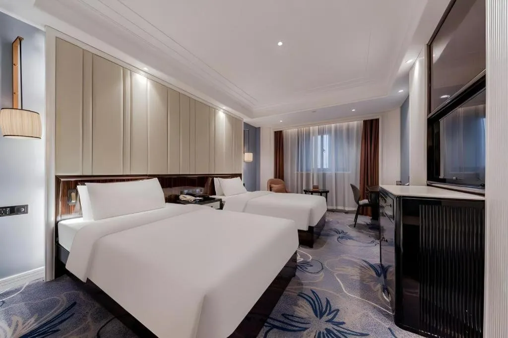 Bed in Jinjiang Metropolo Hotel Nanjing Confucius Temple Branch