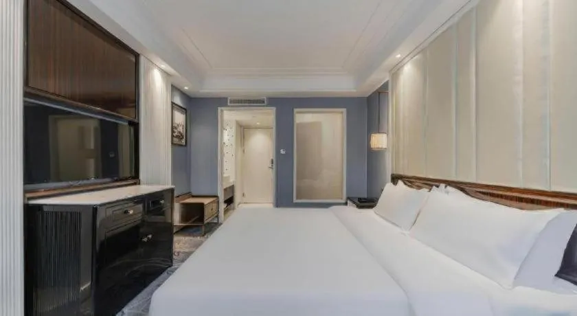 Bed in Jinjiang Metropolo Hotel Nanjing Confucius Temple Branch