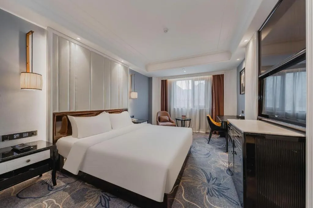 Bed in Jinjiang Metropolo Hotel Nanjing Confucius Temple Branch