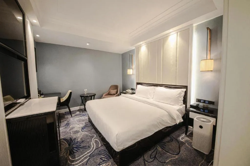 Bed in Jinjiang Metropolo Hotel Nanjing Confucius Temple Branch