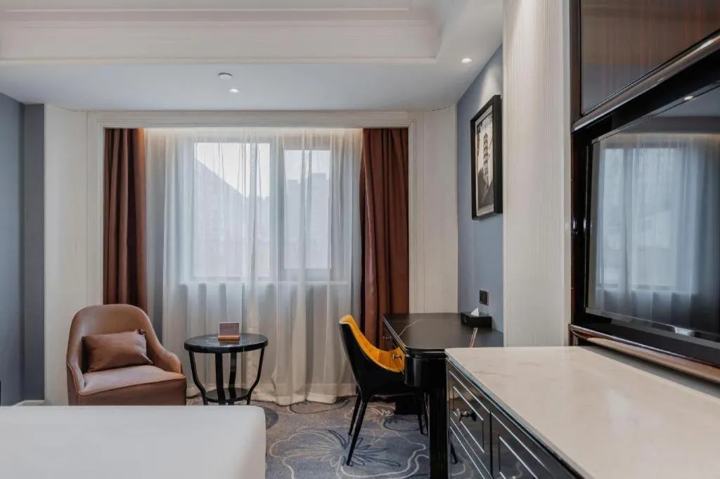 Bed in Jinjiang Metropolo Hotel Nanjing Confucius Temple Branch