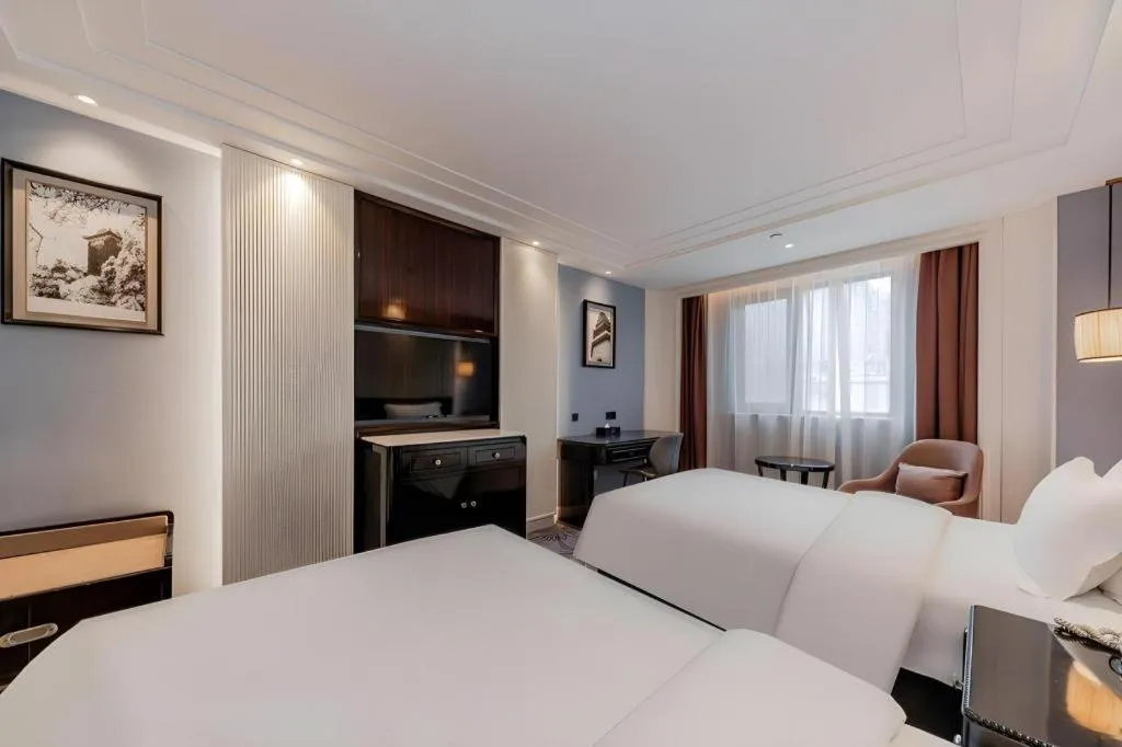 Bed in Jinjiang Metropolo Hotel Nanjing Confucius Temple Branch