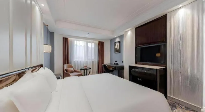 Bed in Jinjiang Metropolo Hotel Nanjing Confucius Temple Branch