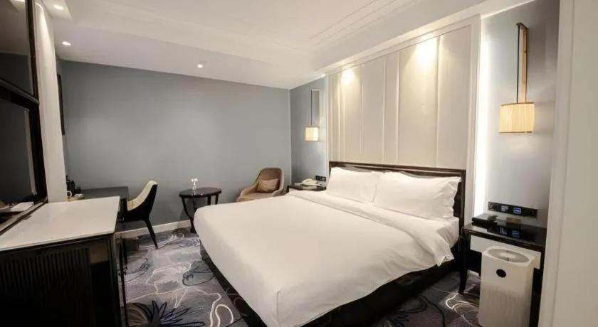 Bed in Jinjiang Metropolo Hotel Nanjing Confucius Temple Branch