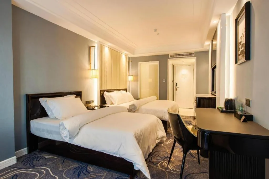 Bed in Jinjiang Metropolo Hotel Nanjing Confucius Temple Branch